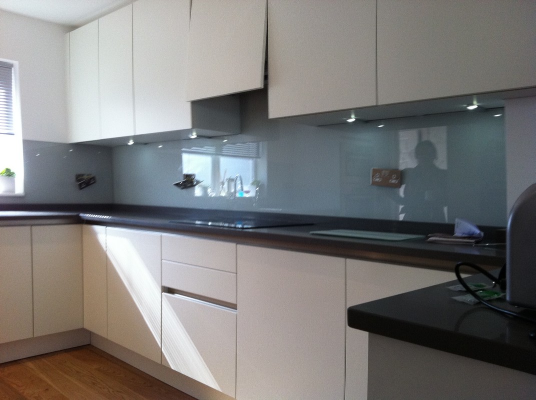 Grey glass kitchen splashback with LED lighting in Merton