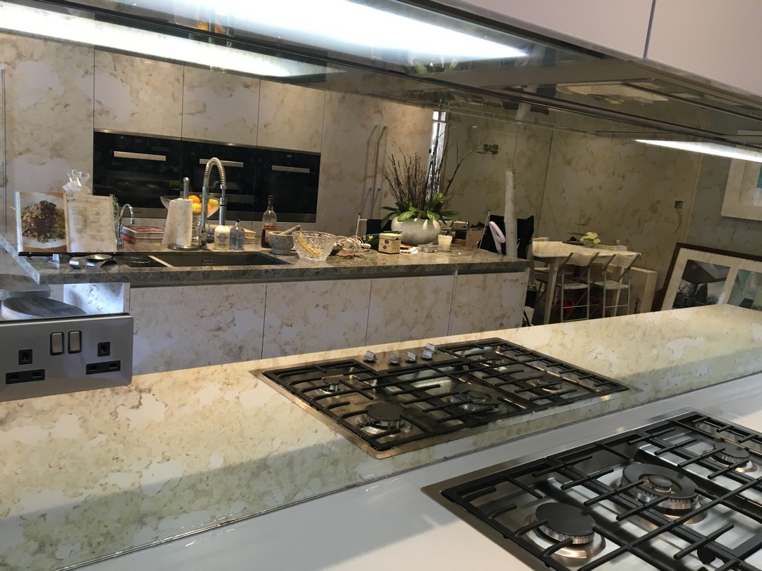 Mirror glass splashback in Merton luxury kitchen